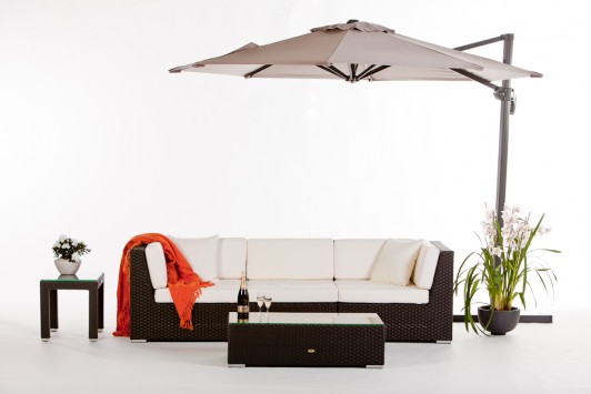 Garden furniture Ninja Parasol in sandy brown, with a rattan lounge